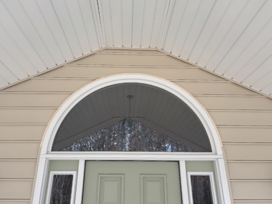 Arched entry & soffit after